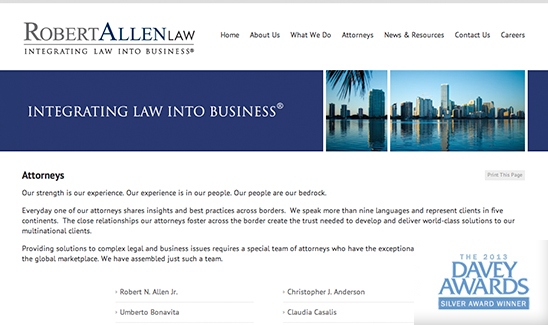 Screenshot of the Robert Allen Law website showing the slogan "Integrating Law into Business" with a city skyline photo, a section about attorneys, and a mention of PaperStreet Wins Multiple Awards in 2013 including the Davey Awards Silver Award.