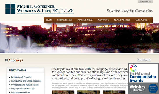 Screenshot of a law firm's website homepage featuring a navigation menu, their motto "Expertise. Integrity. Compassion.", and an award badge for the 19th Annual Communicator Awards, highlighting PaperStreet wins multiple awards in 2013.