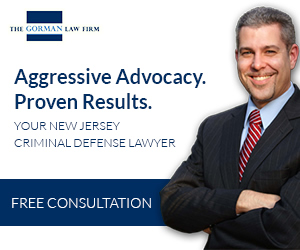Advertisement for The Gorman Law Firm featuring a man in a suit. Text reads: "Aggressive Advocacy. Proven Results. Your New Jersey Criminal Defense Lawyer. Free Consultation.