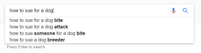 A Google search page showing autocomplete suggestions for the query "how to sue for a dog," including options like "bite," "attack," "someone for a dog bite," and "breeder.