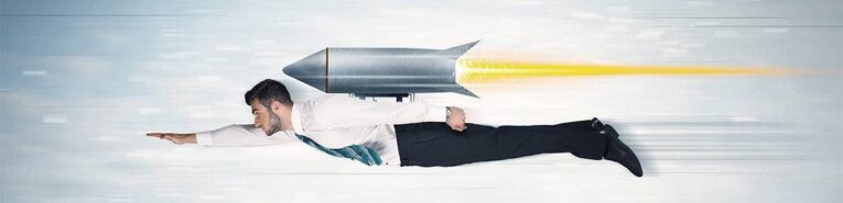 A man in a business suit is flying horizontally with a jetpack on his back, emitting a yellow flame against a blurred motion background, much like the boost your site gets from implementing 10 helpful tips that improve website load speed.