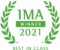A green laurel wreath surrounds the text "IMA Winner 2021" with "Best in Class" below.