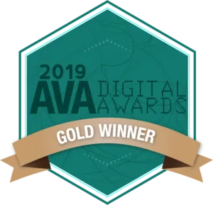 A teal hexagon-shaped badge with "2019 AVA Digital Awards" text and a gold ribbon reading "Gold Winner" across the bottom.