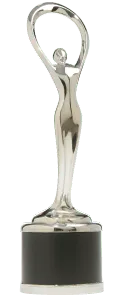 A silver trophy with a figure of a person standing atop a black base.