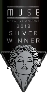 Muse Creative Awards 2019 Silver Winner, featuring a stylized face in a triangular frame.