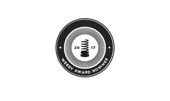 Black and white circular logo with a coil in the center, surrounded by the text "2017 Webby Award Nominee.