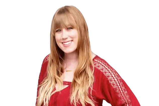 A woman with long blonde hair wearing a red top with lace details on the sleeves smiles at the camera.