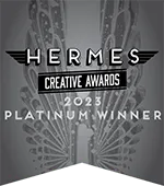 Hermes Creative Awards 2023 Platinum Winner" text on a grey background with wing design.