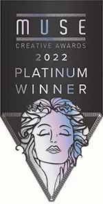 MUSE Creative Awards 2022 Platinum Winner badge featuring artistic illustration of a woman's face.