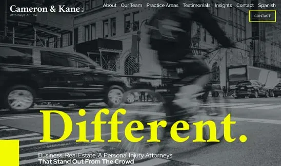 A black-and-white image features the Cameron & Kane law firm website with text emphasizing "Different." A blurred cyclist rides past a crosswalk in front of an office building.