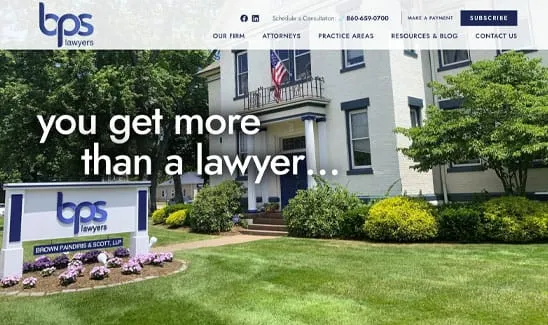 A screenshot of a law firm's website displaying an exterior view of the firm's building, their logo, contact information, and the slogan "you get more than a lawyer...