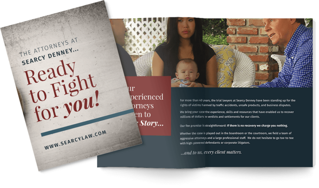 A booklet for Searcy Denney law firm with the text "Ready to Fight for you!" and "we do not hesitate to go toe-to-toe with big business... and win." Image of a serious-looking family inside.