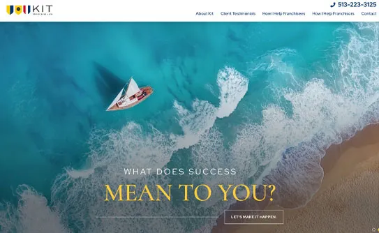 Aerial view of a small sailboat in a blue ocean near a sandy beach. Text overlay reads, "What does success mean to you? Let's make it happen." KIT Franchise displayed at the top.