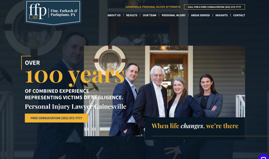 Group of four lawyers, three men and one woman, standing outside a building. Text on the image highlights "over 100 years of combined experience" in personal injury law.