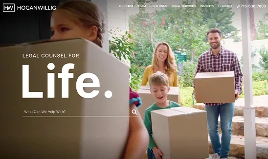 A family carrying cardboard boxes moves into a new house. The text reads "LEGAL COUNSEL FOR Life." The website header includes menu items and contact information for HoganWillig law firm.