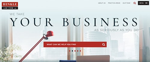 A website banner for Hinkle Law Firm with the text "WE TAKE YOUR BUSINESS AS SERIOUSLY AS YOU DO" and a search bar beneath it. The background features a cityscape with modern buildings.