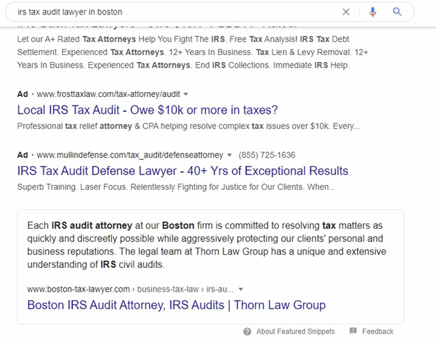 Search results page displaying ads and links for IRS tax audit lawyers in Boston. The results include law firms highlighting their expertise in tax audit defense and legal services.