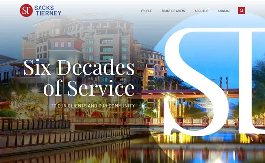 Sacks Tierney website screenshot displaying a cityscape background with text, "Six Decades of Service to Our Clients and Our Community.