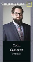 A professional headshot of an attorney named Colin Cameron. He is wearing a suit, tie, and glasses. The website banner reads "Cameron & Kanes" with a menu icon in the top right corner.