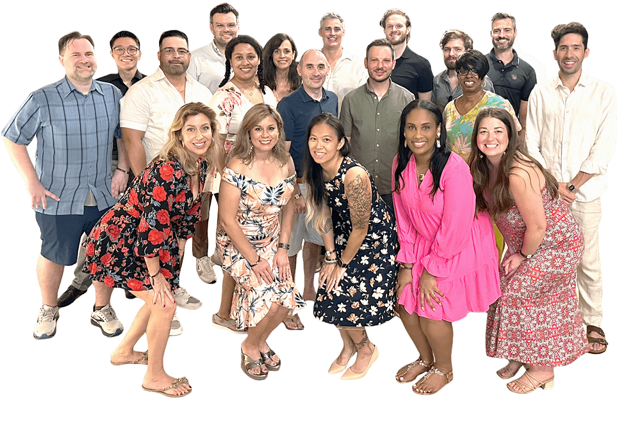 A diverse group of 20 adults, some standing and some crouching in front, posing and smiling for a group photo.