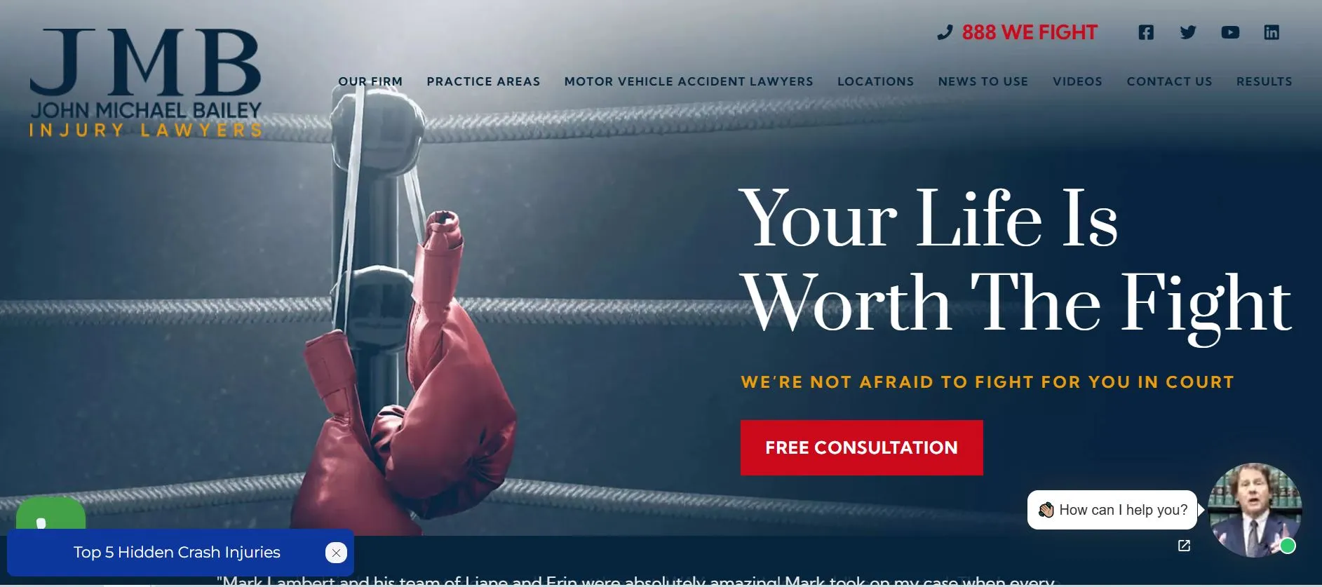 A boxing glove raised in a ring with text promoting injury lawyer services and a free consultation.