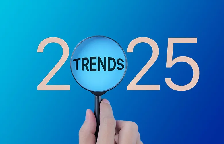 A hand holds a magnifying glass over "TRENDS" and 2025: What is shaping content marketing?.