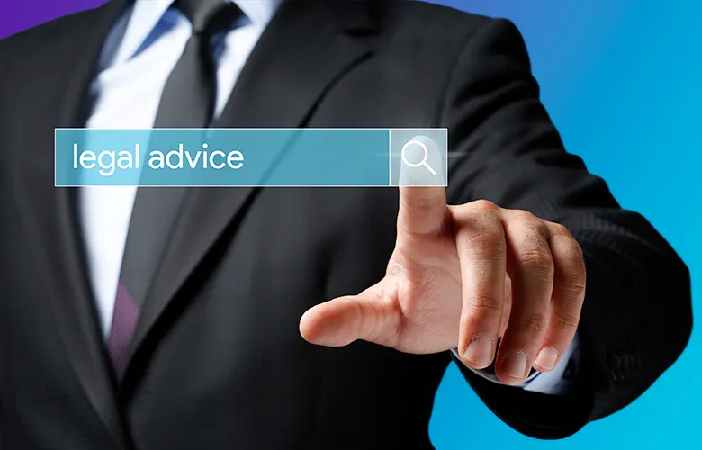 Man in suit touching a virtual search bar labeled “legal advice” with blue background.